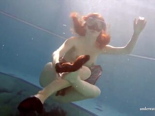 Big tits brunette Mia underwater naked