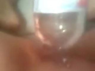 Young lady 19 years old fucked a big bottle