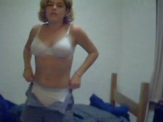 Amater Web Cam Strip teenager In A Blue Shirt