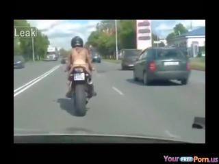 Mudo on motorcycle