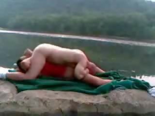 Couple get gorgeous and naughty fucking beside the lake clip